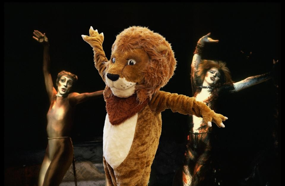 The Library's Lion mascot photoshopped into a photo from the musical cats