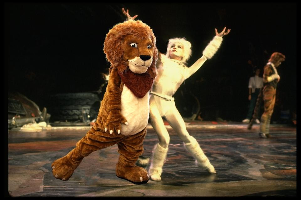 The Library's Lion mascot photoshopped into a photo from the musical 'Cats'