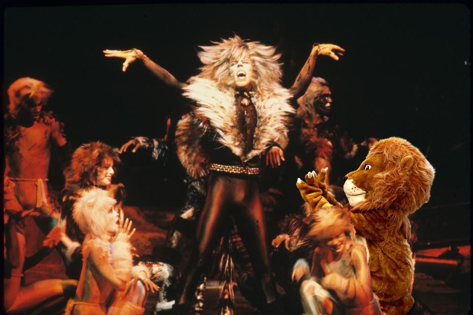 The Library's Lion mascot photoshopped into a photo from the musical ‘Cats’