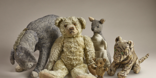 Original stuffed animals Winnie the Pooh, Eeyore, Kanga, Piglet, and Tigger
