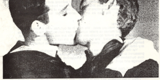 Two men kiss; text below reads: "Read my lips"