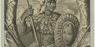 a stylized moctezuma dressed in feathers and a feathered headdress stands holding a spear and shield in an ornametal frame